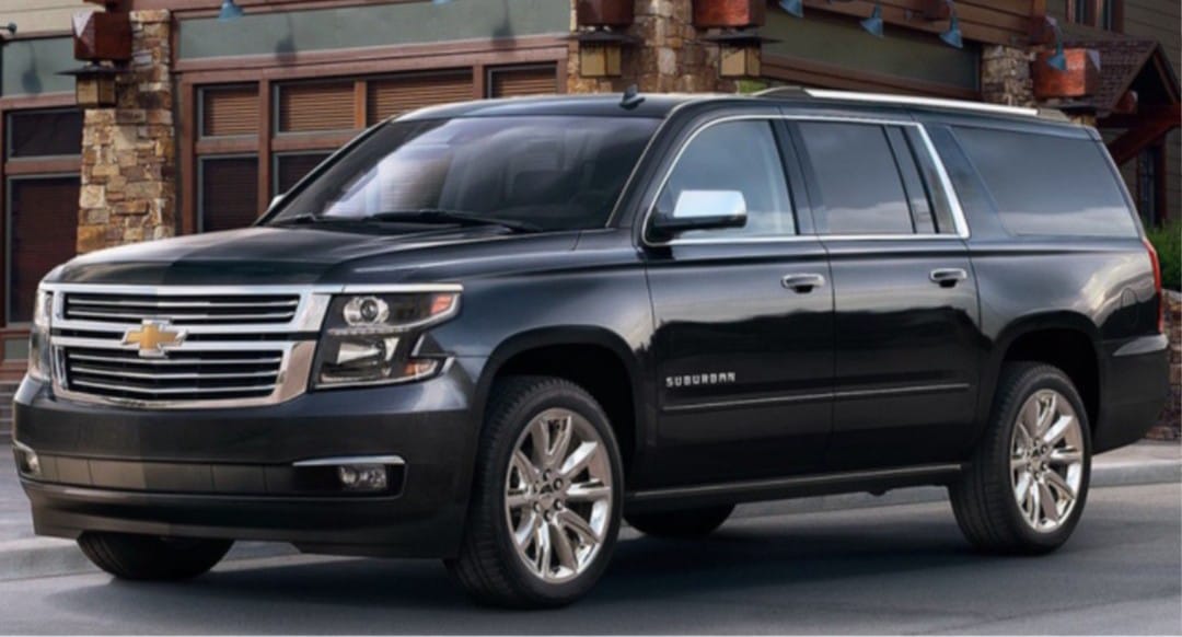 Black Chevy Suburban Luxury SUV Transportation Stock Photo